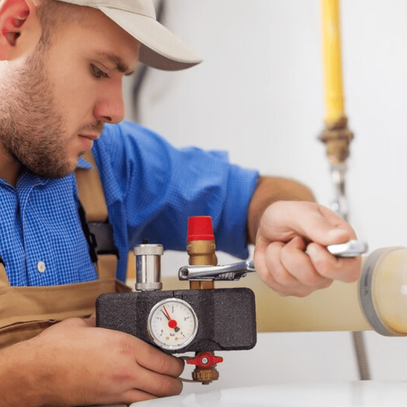 Young man worker using tool for work